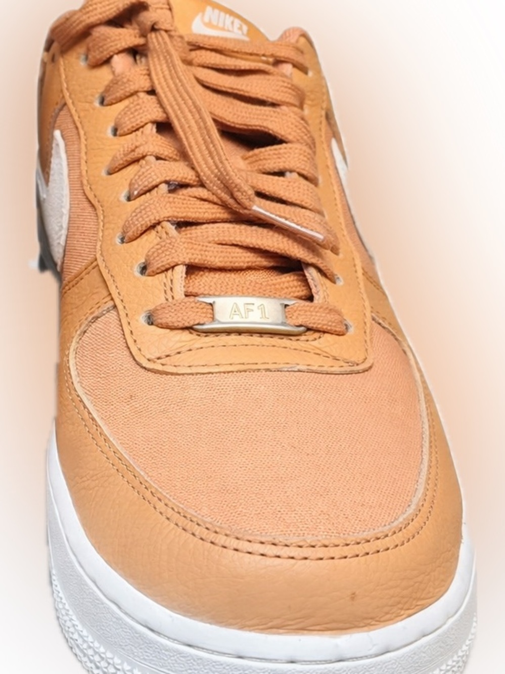 Nike Air Force Ones Peach Leather Low-Top Sneakers with Cream Laces